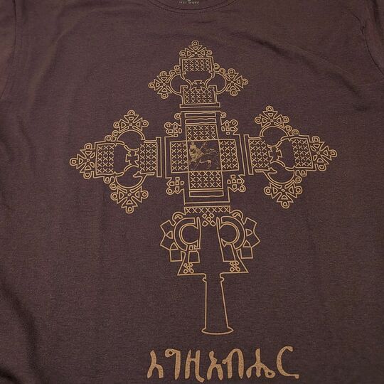 Ethiopian Rastafarian Cross T-Shirt እግዚአብሔር in brown color